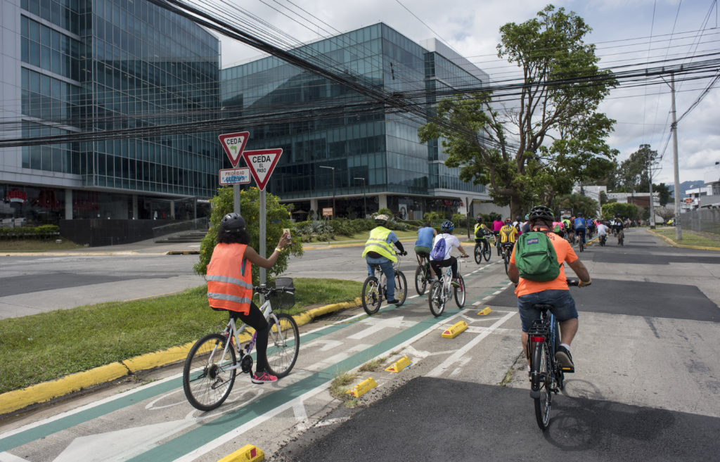Bicycle riders with reflective vests in San Jose Costa Rica
