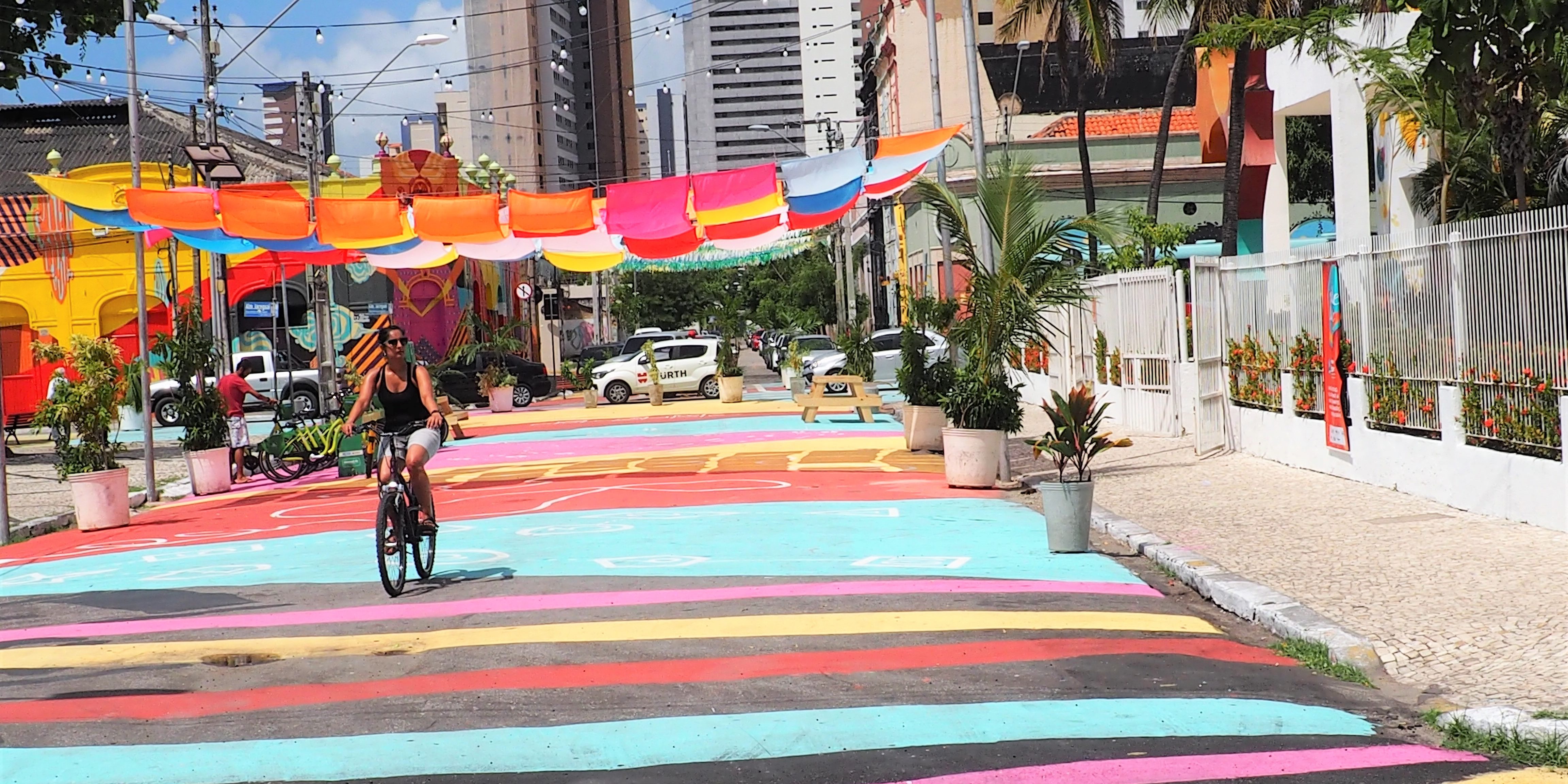 Woman on colorful street in Fortaleza