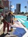MOBILIZE participants had the opportunity to participate in a tactical urbanism project where they reclaimed space for pedestrians through paint, planters, and urban furniture.